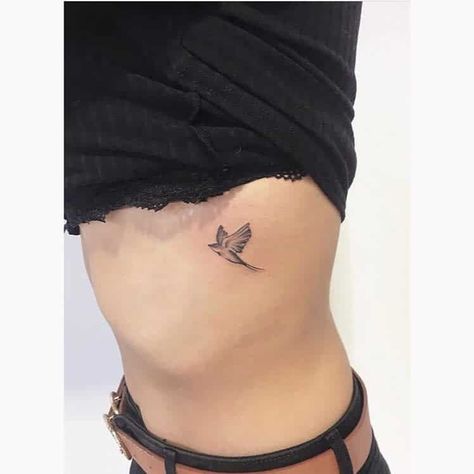 Top 61 Best Small Bird Tattoo Ideas - [2021 Inspiration Guide] Bird Rib Tattoos For Women, Bird Tatoos Woman, Bird Tattoo On Ribs, Bird Rib Tattoo, Small Bird Tattoo Ideas, Mockingbird Tattoo, Bird Tattoo Ideas, Bird Tattoo Ribs, Swallow Tattoos