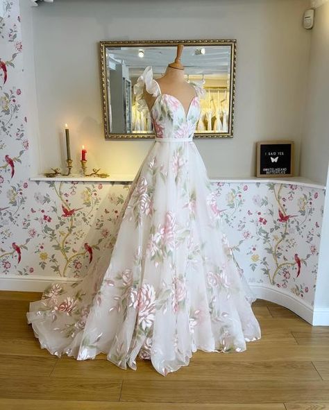 White Lace & Butterflies on Instagram: "~ for a limited time only ~   Don’t miss her, she won’t be here for long!   ‘Isla’ ~ A brand new hand painted beauty 🌸 Book now via our website ~ GO,  GO, GO!  .⁣ .⁣ .⁣ #gownshopping #luxurywedding #handmade #weddinginspiration #ukbrides #bespokebride #romanticbride #floralgown #newlyengaged #colorfulweddingdress #weddingdressshopping #justengaged #weddingdress #2025bride #couturebridal #weddinggoals #sayyestothedress #coutureweddingdress #bridalstyle #modernbride #dreamwedding #uniqueweddingdress #floralweddingdress #2025wedding #intimatewedding #outdoorwedding #bohoweddingdress #engaged #bridetobe" Wedding Dresses With A Pop Of Color, Floral Bridal Gown, Floral Wedding Dress Colored Embroidered, Hand Painted Wedding Dress, Conservative Wedding Dress, A Line Wedding Dress Sweetheart, Ruffle Bridal Gown, Long Bridal Gown, Robes Glamour