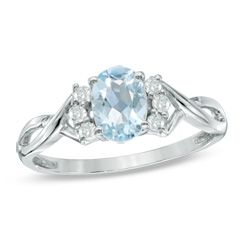 Oval Lab-Created Aquamarine and 1/8 CT. T.W. Diamond Ring in 10K White Gold - View All Jewelry - Gordon's Jewelers Beautiful Rings Engagement, Oval Aquamarine Ring, Blue Wedding Rings, Gold Flower Ring, Floral Engagement Ring, Oval Cut Engagement Ring, Unique Diamond Rings, Sapphire Engagement Ring Blue, Wedding Rings Rose Gold