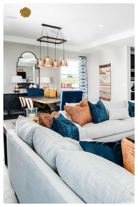 Blue And Copper Living Room, Orange Accents Living Room, Pendant Lighting Living Room, Blue And Orange Living Room, Curtains Bangs, Burnt Orange Living Room, Pendant Lighting Living, Copper Living Room, Navy Living Rooms