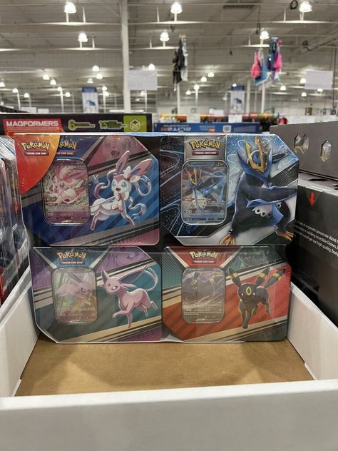 Costco sells this Pokémon V-Tin TCG Cards assortment pack for $64.99. Costco has been selling these Pokémon Cards for the last several years. This is the latest one which is the V-Tin assortment. This comes in a 4-pack and each tin comes with 5 TCG Booster packs. That means you get 20 Booster packs for a little over $3 / each. If you know someone who is into Pokémon, this would make for a GREAT gift. Click here for more.... https://costcofan.com/costco-pokemon-v-tin-assortment-tcg-cards/ Pokemon 200, Pokemon Card Packs, Pokemon Tins, Kids Toys For Christmas, Pokemon Tcg Cards, Pokemon Packs, Tcg Cards, Pokemon Gifts, Pokemon Trading Card Game