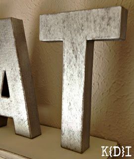 Here's What You'll Need:  Metallic Spray Paint  Paper Mache Letters  Sand Paper Paper Mache Letters Decorating Ideas, Diy Paper Mache, Letters Paper, Metallic Letters, Baby Name Letters, Letters Diy, Diy Projects For Men, Cardboard Letters, Paper Mache Letters