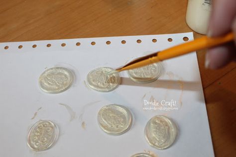 Easy to make your own Wax Seal Stickers with...  You guessed it!  Hot glue!   You'll need your Glue Gun...and Gluegun.com  has tons of gre... Cricut Engraving Tool, December Journal Ideas, Wax Seal Stamp Diy, Cricut Engraving, Homemade Envelopes, Craft Paper Flowers, Wax Seal Stickers, Quill And Ink, Wax Seal Stamp Kit