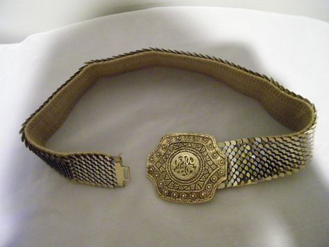 Vintage Gold and Silvertone Fish Scale Wide Stretch  Belt.   It has a fancy  buckle. The buckle measures 3 1/4 inches long by 3 inches wide. It has a hook closure.  It measures 24 inches long by 1 3/4 inches wide.      It is in very good condition. This item is pre-owned.  It may show slight signs of wear and use. Please cat walk my other vintage items. You may find a DD Purrfect Treasure to own. Gold Belt Buckle, Much Style, Gold Belt, Stretch Belt, Fish Scale, Fish Scales, Cat Walk, Suspender Belt, My Dream Wardrobe