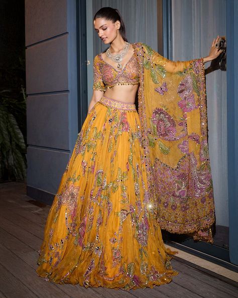 Heavy Hand Embroidered Lehenga Blouse and Heavy Odhani.From Mahima Mahajan's Fitoor collection. DELIVERY TIMEPlease allow 6-8 weeks for your outfit to arrive. FABRIC DETAILSOrganza Professional cleaning only. Mustard Yellow Bridal Lehenga, Mahima Mahajan Lehenga, Mahima Mahajan Outfits, Yellow Haldi Outfit For Bride, Mayoun Dress, Holud Outfit, Yellow Indian Outfit, Lehenga For Haldi, Mustard Yellow Lehenga