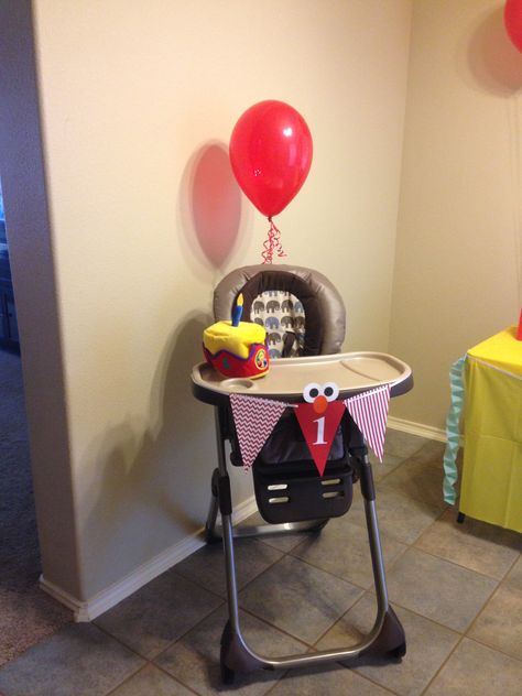 Elmo birthday high chair. Elmo High Chair Decoration, High Chair Decorations 1st Birthday, Elmo Birthday Party Decorations, High Chair Decorations, Birthday High Chair, 1st Birthday Boy, Elmo Birthday Party, Elmo Birthday, Chair Decorations