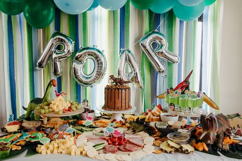 Dinosaur Grazing Table, Dinosaur Kids Party, Grazing Food, Birthday Party At Home, Dinosaur Footprint, Chocolate Drip Cake, Dinosaur Themed Birthday Party, Dinosaur Eggs, Faux Leaf