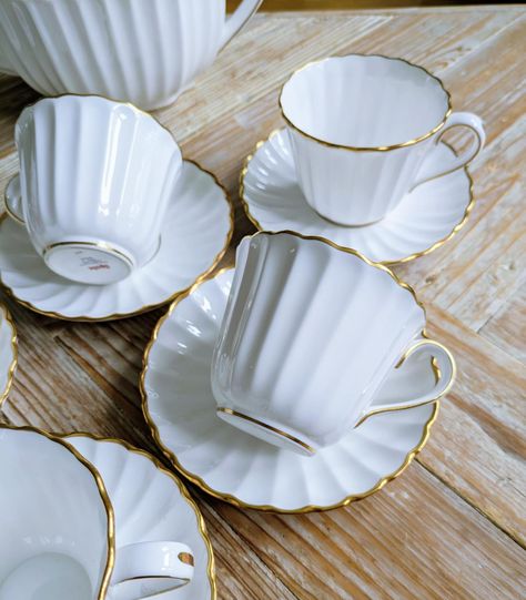 Spode Midas Tea Set. Simple white elegance with gold rims. Generous size cups. All In great condition without any chips, cracks or crazing. This set includes 1x Large Teapot 6x Cups (8.5cm/3.5" in diameter and 7cm/2.7" tall 6x Saucers Price for the set is £95 plus postage #antiqueandvintagebynes #spodemidas #spodeteaset #vintageteaset White Elegance, Tea Sets Vintage, Simple White, Tea Set, Tea Pots, Conditioner, Chips, Tea, Gold