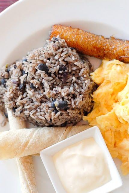 Costa Rican Gallo Pinto (beans and rice) recipe is a flavorful, filling traditional breakfast recipe. This authentic easy recipe can be made in your kitchen! It can be served at any meal as a tasty side dish. #rice #beans #CostaRica Pinto Beans And Rice, Breakfast Mexican, Costa Rico, Costa Rican Food, Gallo Pinto, Guanacaste Costa Rica, Brunch Club, Ideas For Breakfast, Mexican Casserole