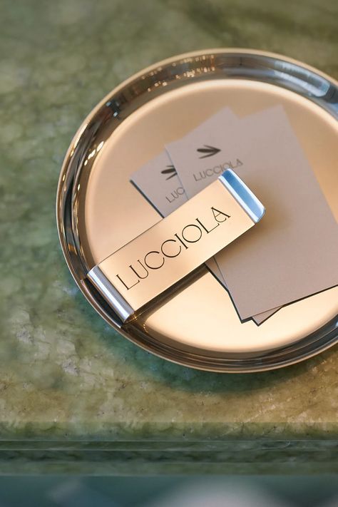 Lucciola restaurant - Fonts In Use Restaurant Font, Hospitality Branding, Check Presenter, Marble Bar, Bill Holder, Collateral Design, Folder Design, Tray Design, Hotel Branding