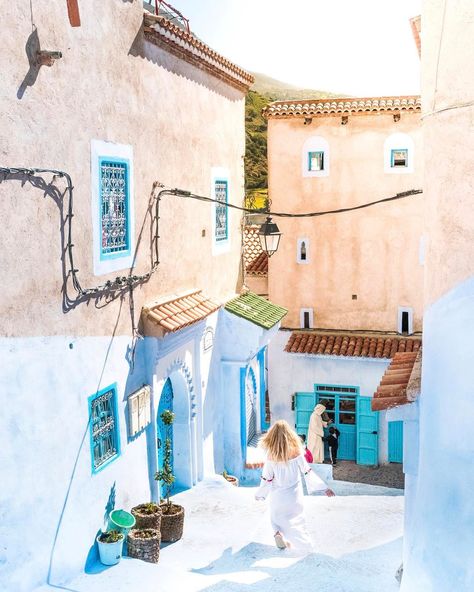 Running through the blue streets of Chefchaouen #morocco #blue #pearl #city #Chefchaouen #street #streets #beautiful #mountains #village #color #white #dress #blond #girl Morocco Itinerary, Chefchaouen Morocco, Visit Morocco, Morocco Travel, Blue City, Unique Experiences, Africa Travel, Botswana, Casablanca