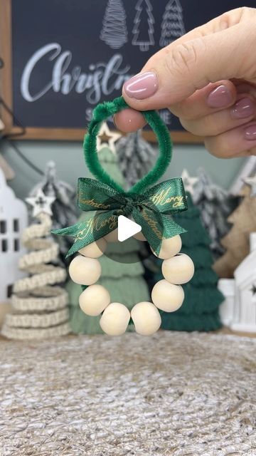 Caroline Fleming on Instagram: "Mini wooden bead wreath  I used a craft pipe cleaner and 10 wooden beads, size 15mm with a 6mm hole and added a little ribbon to finish the wreath. So simple to make a very easy diy Christmas craft idea 🌲❤️#miniwreaths #woodenbeadwreath #diychristmascrafts #christmascraftideas #diychristmasdecoration #diychristmasornament" Christmas Wreath Beads, Bead Wreath Ornament, Pipe Cleaner Wreath, Christmas Crafts Pipe Cleaners, Mini Wreath Diy, Wooden Bead Wreath, Caroline Fleming, Craft Pipe Cleaner, Macrame Ornaments