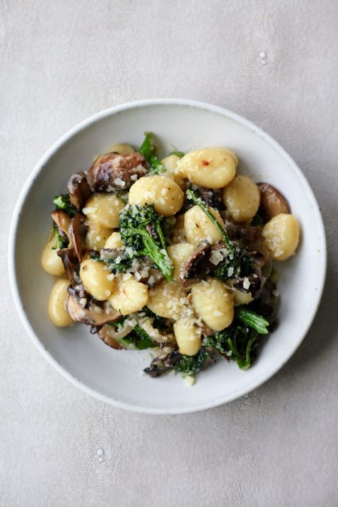 Soft and pillowy gnocchi are tossed together with a hearty mushroom, broccolini, and parmesan sauce for a delicious, vegetarian weeknight dinner. Gnocchi Easy, Gnocchi Parmesan, Gnocchi Mushroom, Mushroom Gnocchi, How To Cook Gnocchi, Parmesan Sauce, Creamy Mushrooms, Delicious Vegetarian, 30 Minute Meals