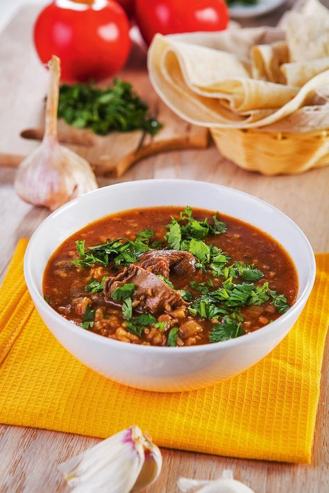 Kharcho is a traditional Georgian soup originating in containing beef, rice and chopped walnuts. Kharcho Recipe, Kharcho Soup, Georgian Recipes, Pork Soup Recipes, Beef Entrees, Georgian Cuisine, Georgian Food, Eastern European Recipes, Beef Rice