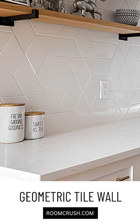 Don't be afraid of making bold statements with your tile patterns, in unconventional ways. Tiles don't have to be restricted to one little backsplash area. For our 90s kitchen makeover, we tiled one whole floor-to-ceiling wall in a wild geometric pattern, and it's one of my favorite things about the house now. A fully tiled wall is unexpected and gives the kitchen a truly one-of-a-kind feel. Triangle Backsplash, Tile Update, Kitchen Tile Backsplash Ideas, Geometric Tile Backsplash, Stylish Apartment Decor, Kitchen Wall Tiles Backsplash, Tile Backsplash Ideas, Dining Room Rug Size, 90s Kitchen