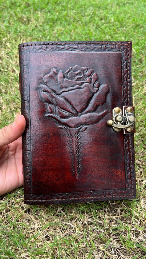 "Beautiful Rose Flower Hand Embossed Leather Journals Soft and Durable Dark Brown Genuine Leather,  - No glue used. - Hand Stitched. - Binding diary (paper is not refillable). - Real Leather scent. - Hand embossed. - each journal is specially designed and Handmade. Size - (length) 7\" x (Hight) 5\" x (width) 2\" inch. A perfect combination of luxurious leather cover and perfect quality Of Deckle Edge paper. OUR DARK BROWN LEATHERBOUND NOTEBOOKS MAKE HEARTWARMING BIRTHDAY, ANNIVERSARY, VALENTINE' Hardcover Leather Journal, Leather Cover Book, Leather Journal Ideas, Diary Paper, Leather Scent, Leather Bound Notebook, Embossed Leather Journal, Leather Embossing, Vintage Leather Journals