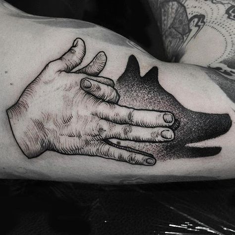 foda ______ #artist#arts#tattoo#tattoos#tattooed#tattooartist#art#artwork#blackwork#blacktattoo#blackandgrey#dotwork#armtattoo#sleevetattoo#tattoolife#inklife#lineart#linework#creative#bw#ink#inked#tatuagem#tatouage#tatuaje#tattooart#tattooist#tattooer#bodyart#tattoodesign Hand Shadow Tattoo, Artsy Tattoos, Shadow Tattoo, Shadow Wolf, Hand Shadows, Inspiration Tattoo, Dot Work Tattoo, Dark Tattoo, Shadow Puppets