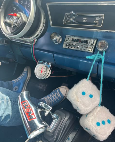 Blue Old Car Aesthetic, Denim Car Interior, Fuzzy Car Dice, Fuzzy Dice Aesthetic, Car Dice Aesthetic, Blue Race Car Aesthetic, Car Mods Interior Blue, Blue Driving Aesthetic, Blue Car Aesthetic Interior