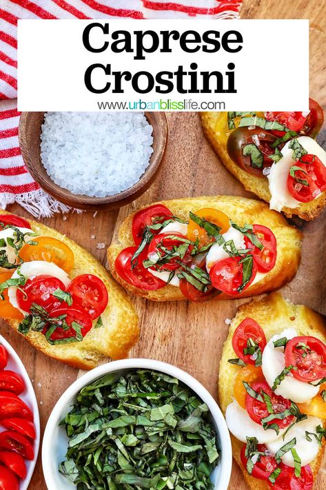 Caprese Crostini is an easy, delicious party appetizer or a beautiful side dish to any busy weeknight dinner. Get the recipe at UrbanBlissLife.com. Caprese Crostini, Crostini Toppings, Caprese Appetizer, Fancy Appetizer Recipes, Caprese Bites, Yummy Appetizers Parties, Crostini Appetizers, Caprese Recipes, Basil Olive Oil