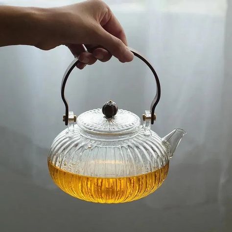 Looking for a "Pumpkin Perfection" Tea Pot that offers quality, style, and affordability? Well you are at the right place!🎉 Elevate your tea time with the "Pumpkin Perfection" Tea Pot! This adorable and unique teapot adds a touch of whimsy to every cup of tea. Its pumpkin shape is sure to delight your guests and make every tea moment feel extra special. Crafted with love and attention to detail, this teapot is perfect for holiday gatherings and cozy autumn afternoons.Benefits: Whimsical De... Teapots Unique, Chinese Tea Ceremony, Kitchen Accessories Decor, Kitchen Timers, Glass Teapot, One Candle, Heat Resistant Glass, Fruit Tea, Chinese Tea