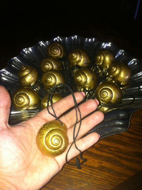 Ursula's Necklaces I made as a party favor. Seashells found at a thrift store. Gold paint & black thread from Michael’s. Mermaid Necklaces, Villain Party, Disney Villain Party, Mermaid Pirate Party, Lil Mermaid, Balloon Displays, Villains Party, Ariel Birthday Party, Descendants Costumes