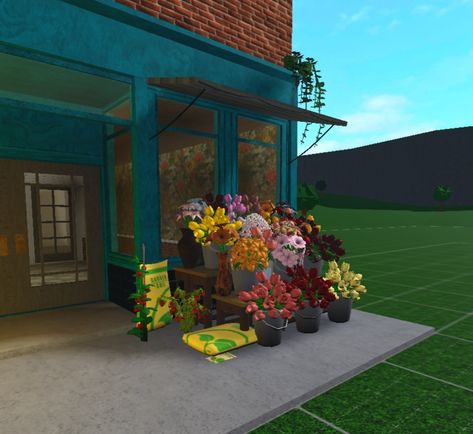 Bloxburg Antique Shop, Flower Shop In Bloxburg, Daniel Perkins Bloxburg, Flower Store Bloxburg, Bloxburg Flower Stand, Convience Store Bloxburg, Bloxburg Flower Shop Ideas Interior, Bloxburg Poor House, Farmers Market Bloxburg