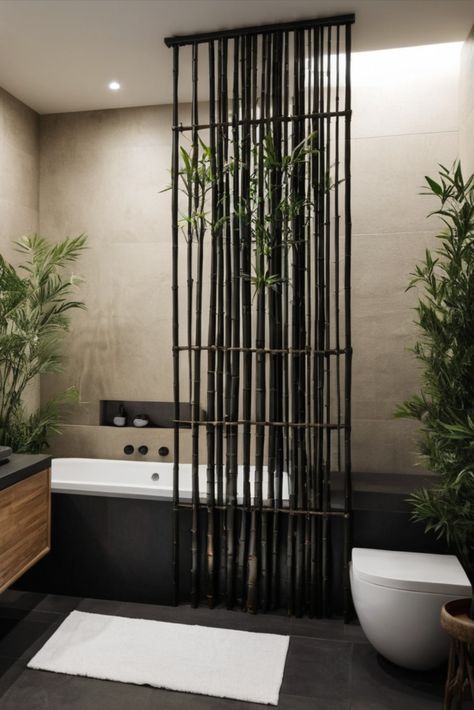 Transform your bathroom into a meditative space with dark bamboo screening and calming black pebble details. Your daily escape awaits. #ZenBathroom #BambooDesign #SpaInspired Bamboo Shower Wall, Black And Bamboo Bathroom, Black White And Green Bathroom, White And Green Bathroom, Meditative Space, Asian Bathroom, Bamboo Screening, Zen Bathroom, Bathroom Retreat