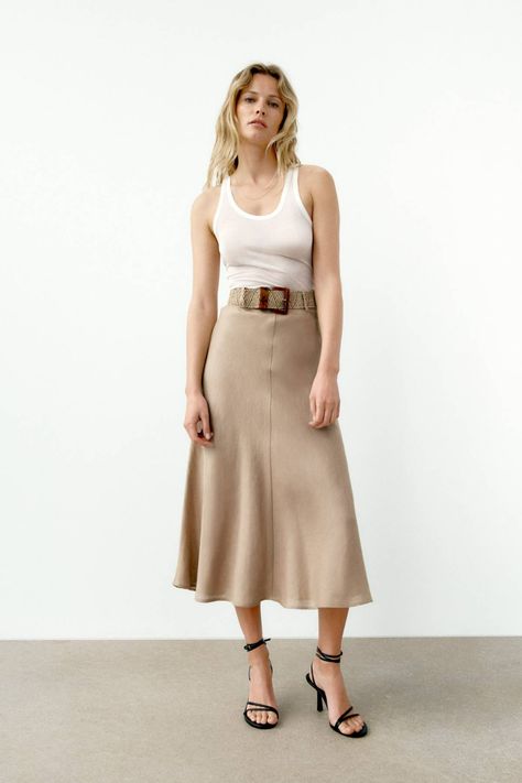 28 Zara Best Sellers That Will Sell Out by Next Month | Who What Wear Cape Skirt, Trench Beige, Ruched Midi Skirt, Printed Pleated Skirt, Animal Print Skirt, Geometric Print Dress, Skirts Midi High Waisted, Leather Midi Skirt, Straight Crop Jeans