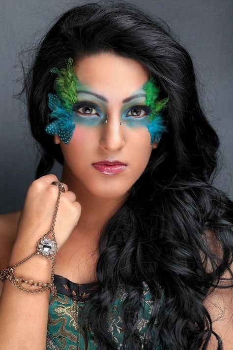 A creative makeup look I did with feathers Bird Eye Makeup, Feather Makeup Look, Feather Makeup, Makeup With Feathers, Feathers On Face, Bird Inspired Makeup, Bird Makeup Ideas, Parrot Makeup, Hummingbird Makeup