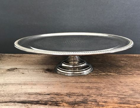 vintage cake stand silverplated pedestal cake stand silver dessert server cake shop display ornate round silver cake plate decorative stand by GlyndasVintageshop on Etsy Cake Shop Display, Plated Cake, Asian Wall Decor, Silver Cake Stand, Marble Candle Holder, Decorative Stand, Silver Cake, Vintage Cake Stands, Marble Candle