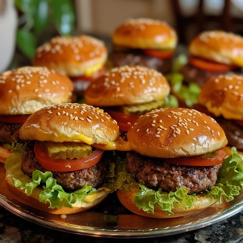 Mini Burger Sliders with All the Fixings 🍔 🌟 "Elevate your Memorial Day with our Mini Burger Sliders! Small in size, big on flavor and fun! 🍔🎉" Recipe: Mini Burger Sliders with All the Fixings Ingredients: 1 lb ground beef 12 mini burger buns Lettuce, sliced tomatoes, pickles Cheese slices Ketchup, mustard, mayo Instructions: Form beef into small patties and grill until desired doneness. Assemble sliders with cheese, lettuce, tomato, and pickles on buns. Add ketchup, mustard, and mayo. 🍔 B... Mini Burger Sliders, Mini Burgers Sliders, Mini Burger Buns, Memorial Day Party, Mini Sliders, Sliced Tomatoes, Mini Burger, Instagram Recipes, Burger Sliders