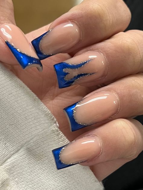 Glitter Royal Blue Nails, Acrylic Nails Blue And Silver, Blue And Silver French Tip Nails, Silver And Royal Blue Nails, Blue And Silver Nails Acrylic, Blue Glitter Nail Designs, Royal Blue And Black Nails, Dark Blue And Silver Nails, Nails Blue Heart