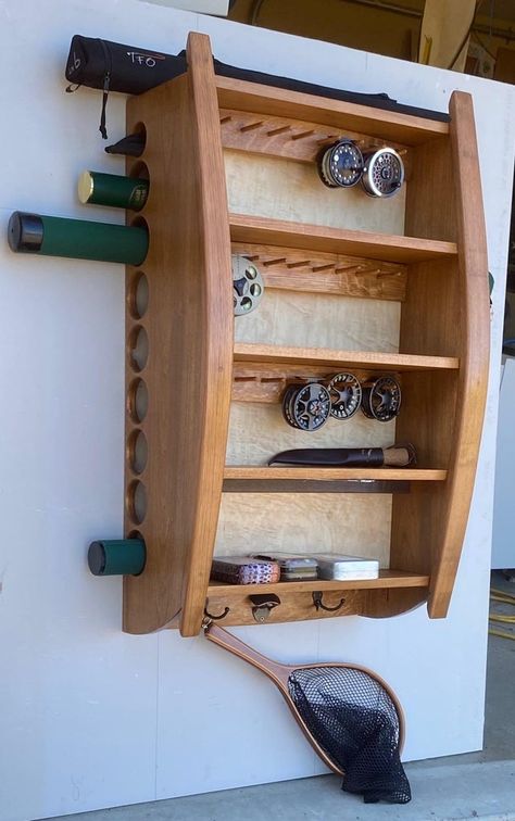 Fly Fishing Storage Ideas, Fly Fishing Room Ideas, Fly Rod Storage, Fishing Furniture, Fly Tying Desk Ideas, Wall Fishing Rod Holder, Fishing Rod Holder For Bedroom, Fly Rod Wall Display, Displaying Antiques