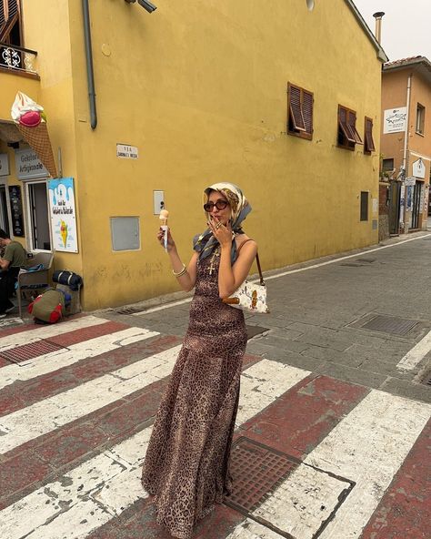 Get ready to slay the day with this fierce cheetah print drop waist dress and chic head scarf combo. Pair it with a vintage Louis Vuitton bag for that extra touch of glam. Who says you can't be stylish while enjoying some ice cream? #FashionInspo #WomensStyle #VintageVibes Green Head Scarf, Head Scarf Outfit, Trucker Hat Outfit, Dress Drop Waist, Slay The Day, Scarf Trends, Head Scarf Styles, Scarf Outfit, Cheetah Print Dress