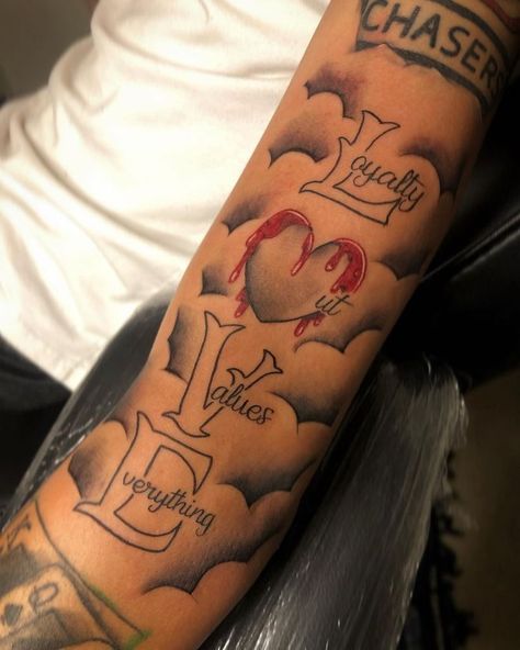 Artist➰ on Instagram: “Loyalty Out Values Everything ✍🏼💯 ft @yfn.liq 💪🏽💪🏽,, Dt❤️& Drop a c… in 2022 | Half sleeve tattoos for guys, Strength tattoo, Arm tattoos black Loyalty Out Values Everything Tattoo Design, Love Loyalty Out Values Everything Tattoo, Love Out Values Everything Tattoo, Loyalty Out Values Everything, Everything Tattoo, Love Tattoo Ideas, Tattoo Ideas For Guys, Meaningful Tattoos For Men, Arm Tattoos Black