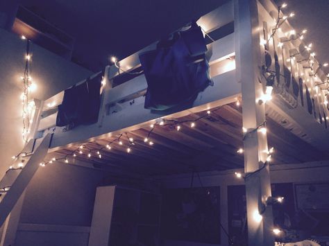 Loft bed/fairy lights/grunge/artsy Aesthetic Bedroom Loftbed, Loft Bed Lights, Fairy Lights Loft Bed, Fairy Lights Loft, Loft Beds Aesthetic, Lights On Bunk Bed, Bunk Bed Decorating Ideas Lights, Loft Bed Fairy Lights, Room Ideas Bunk Beds Aesthetic