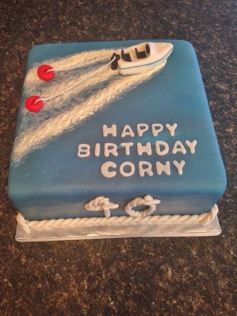 Boat tubing cake Cake Boat Birthday, Birthday Cake Boat Theme, Lake Themed Birthday Cake, Boat Theme Cake, Speed Boat Cake, Sailboat Birthday Cake, Boat Cakes For Boys, Lake Cake Ideas, Boat Cakes For Men