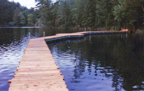 A floating walkway is an alternative to a bridge for transitioning over wetlands and small bodies of water Floating Wetland, Wood Bridge Over Creek, Bridge Over Water, Small Bridge Over Stream, Water Under The Bridge, Floating Architecture, Wooden Walkways, Farm Business, Pedestrian Walkway