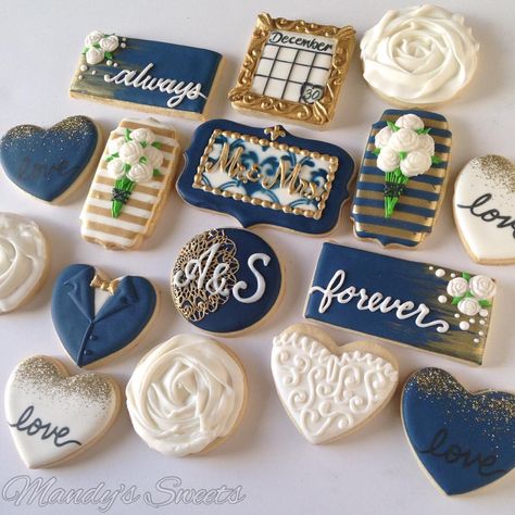 Navy blue and gold wedding cookies 💙💍#navyblue #gold #navyblueandgold #weddingcookies #alwaysandforever #wedding #love #bouquet #mandyssweets Wedding Cake Navy Gold, Navy Blue Wedding Cakes, Navy Bridal Shower, Love Bouquet, Wedding Cake Navy, Navy Blue And Gold Wedding, Engagement Cookies, Blue And Gold Wedding, Wedding Cake Cookies