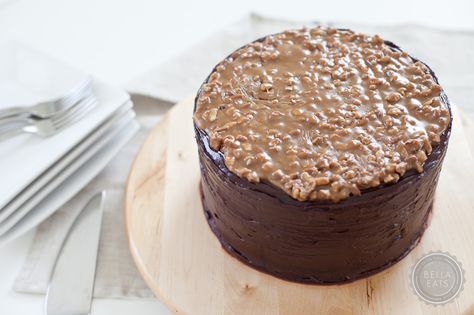 deep dark chocolate cake layered with dark chocolate ganache, topped with a crunchy pecan praline Praline Frosting, Chocolate Bourbon Cake, Praline Cake, Double Chocolate Cake, Bourbon Glaze, Chocolate Bourbon, Cake Frosting Recipe, Candy Cakes, Dark Chocolate Cakes