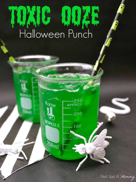 Toxic Ooze, a perfectly icky Halloween Punch Buffet Halloween, Mad Scientist Halloween, Halloween Punch Recipes, Mad Science Party, Ghostbusters Party, Halloween Shots, Halloween Party Drinks, Mad Scientist Party, Scientist Party