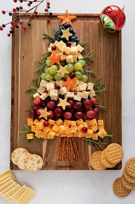 A Christmas Tree Shaped Charcuterie board will be a show stopper at any party and the ingredient options are almost endless. #recipes #holidayfood #christmastree #charcuterie #cheese Tree Shaped Charcuterie Board, Charcuterie Tree, Christmas Tree Charcuterie Board, Christmas Charcuterie Board, Class Mom, Christmas Charcuterie, Assorted Nuts, Cranberry Cheese, Gourmet Cheese