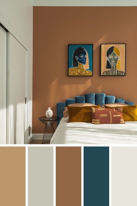 A stylish bedroom in sandterra cotta and blue color shadesWall art that adds color to this bedroom while also making a bold statementFollow me for more inspiration Tan Bedroom Walls, Terra Cotta Living Room, Bedroom Earth Tones, Terra Cotta And Blue, Bright Bedroom Decor, Bold Bedroom, Bright Bedroom, Blue Wall Colors, Tan Walls