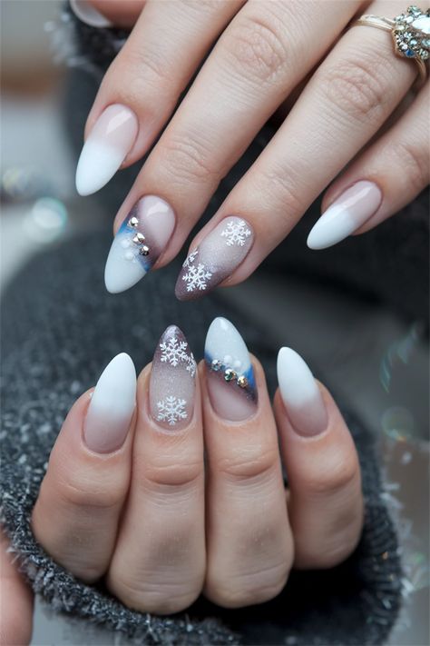 Step into the season with these cozy Winter nail ideas acrylic that bring warmth to the cold days! Picture your nails adorned with icy blues and shimmering snowflakes, capturing the essence of Winter elegance. The matte finish combined with glossy tips creates a striking contrast that will turn heads. Perfect for holiday gatherings or a night out, these nails will keep your style fresh and festive! Try them out and embrace the Winter magic! #NailIdeasAcrylic #WinterNails #NailArt #WinterStyle Snowflake Nail Designs Winter Wonderland, Nail Ideas Acrylic, Cute Nail Ideas, Snowflake Nail Design, Winter Nail Ideas, Winter Picture, Snow Nails, Chic Nail Art, Natural Nail Designs