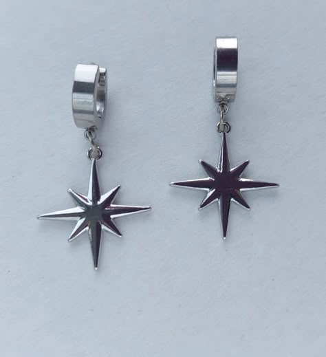 The earrings are adorned with a small star-shaped pendant. The earrings are fastened with stainless steel studs. Earring length - 7.0 cm (2.7 inches) Earrings  are packed in a gift box RECOMMENDATIONS FOR CARE: Do not wet, do not drop, and store in a dark box! - Remove jewelry before exercising, swimming, showering and sleeping. - Avoid contact with moisture such as make-up, moisturizer, lotion, perfume and hairspray. - Store your jewelry in a box or pouch after use. Earrings Grunge, Star Earrings Silver, Grunge Earrings, Polar Star, Earrings Gothic, Silver Star Earrings, Grunge Jewelry, Celestial Earrings, Earring Hoop