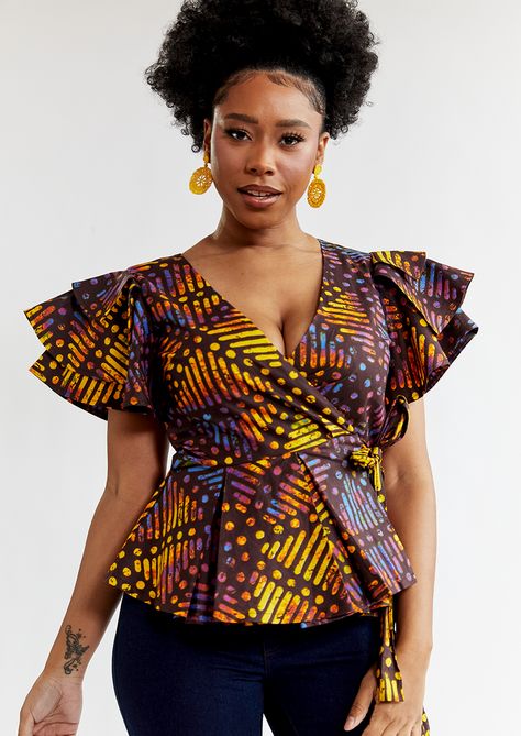 Sankofa, Ghanaian for retrieve, and the name of a mythical bird that represents springtime. With the double later ruffle sleeves and peplum waist, making the 100% cotton light as a feather. The Sunset Adire colorway is sultry, great for the office with a pencil skirt and for being seen out and about in jeans and heels. African Print Peplum Top, African Tops For Women, Modern African Clothing, Mythical Bird, African Blouses, African Tops, African Print Tops, Printed Peplum Top, Birds In The Sky