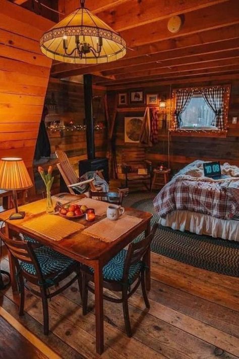 Looking to add some rustic charm to your tiny house? This cozy interior showcases how warm and inviting a small space can be. Discover more rustic tiny house interior ideas on our blog. Click to read the full post! #GoTinySpace #RusticTinyHouse Rustic Tiny House, Log Cabin Interior, Cabin Aesthetic, Cabin Bedroom, Cabin Interiors, Cabin Living, Little Cabin, Log Cabin Homes, Tiny House Interior