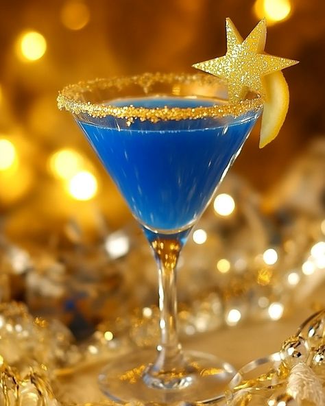 1.5 oz Blue Curacao, 1 oz Vodka, 1 oz Coconut Cream, 2 oz Pineapple Juice, Splash of Club Soda, Edible Glitter (optional), Starfruit slice for garnish  What’s your favorite nighttime sip? Share your thoughts and let's get creative with cocktails! #StarryNightcap #CocktailMagic Ocean Cocktail, Cosmic Christmas, Juice Splash, Drink Decorations, Welcome Drink, Blue Curacao, Club Soda, Edible Glitter, Night Cap