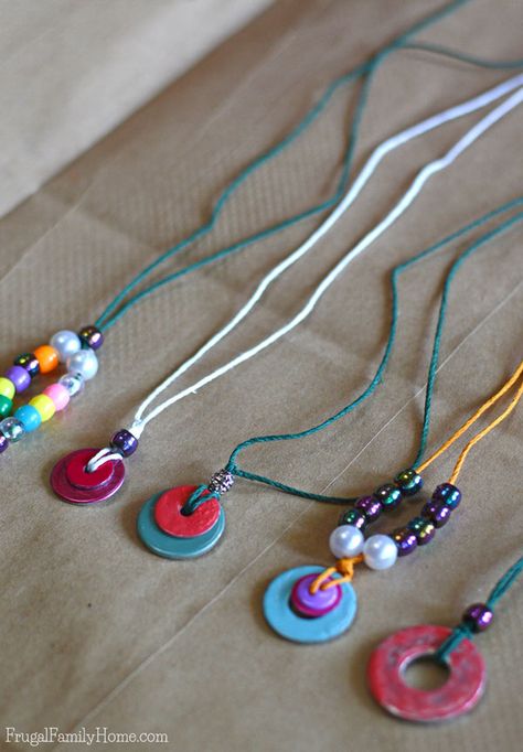 This is a great project to do with the kids, when the summer heat is just too hot outside or on a rainy day. These DIY washer necklaces only take a few items to make. A few washers, beads, nail polish, and a little string is all that is needed to make these really cute necklaces. This is a great idea to get your kids creating instead of complaining. Washer Necklace Tutorial, Diy Washer Necklace, Washer Crafts, Washer Necklaces, Washer Jewelry, Fun Summer Crafts, Cute Necklaces, Nail Polish Crafts, Hot Outside