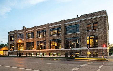 Chris Hawley Architects renovation embraces the character of this old Fargo warehouse. Old Warehouse Exterior, Old Factory Renovation, Warehouse Facade, Warehouse Exterior, Warehouse Architecture, Warehouse Renovation, Brick Warehouse, Midwest Home, Renovation Exterior